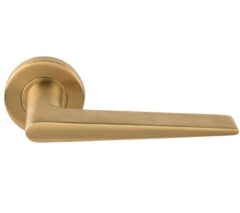 Deurklink BASICS LBXXIH op ronde rozet PVD mat goud