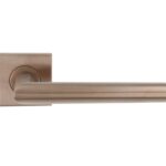 Deurklink BASICS LBII-19BSQR53 op geveerd rozet PVD licht brons