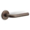 Deurklink BASICS LBIII-19 op ronde rozet brons