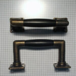 Deurgreep, brons antiek met ebben hout