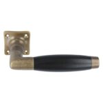 Set deurkrukken brons met ebben, incl. vierk. rozetten