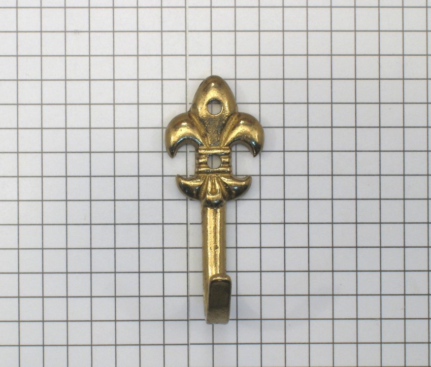 Kapstokhaak fleur de lis, messing midden