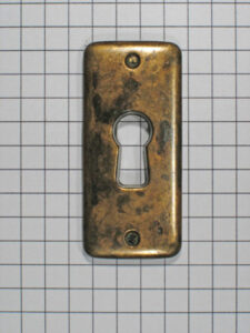 Sleutelplaat vertikaal zamac brons antiek