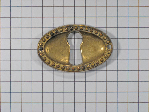 Sleutelplaat ovaal Louis XVI messing antiek