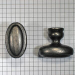 Knop ovaal met rand ijzer blank gelakt 38 x 24 mm