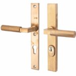 SKG3 PC92 kruk/kruk op smalschild Bauhaus Links + kerntrekbeveiliging messing antiek