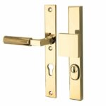 SKG3 PC55 knop/kruk op smalschild Bauhaus Links + kerntrekbeveiliging messing ongelakt