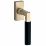 Draaikiepgarnituur Bauhaus ebben messing antiek