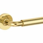 Deurkruk op geveerd rozet Frankfurt/Vivo messing ongelakt