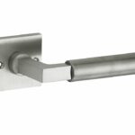 Deurkruk op ongeveerd rozet Bauhaus mat nikkel ongelakt