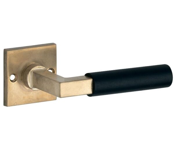 Deurkruk op ongeveerd rozet Bauhaus ebben messing antiek
