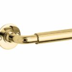 Deurkruk op ongeveerd rozet Frankfurt/Chemin de Fer messing ongelakt