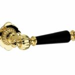 Deurkruk op ongeveerd rozet Nouveau messing gelakt