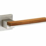 Deurkruk op geveerd rozet Mimolimit mat nikkel ongelakt/teak