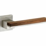 Deurkruk op geveerd rozet Mimolimit mat nikkel ongelakt/walnoot