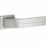 Deurkruk op geveerd rozet Toro mat nikkel ongelakt