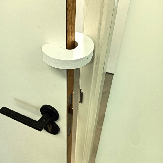 Deurstopper ter bescherming van kinderen wit rubber