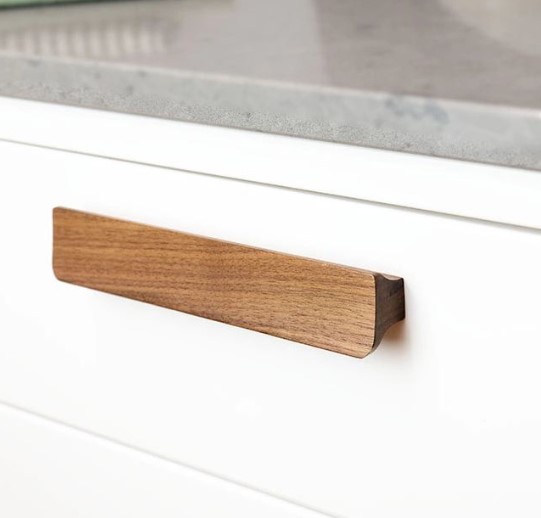 Greep Holsted Walnoot gelakt 128 mm