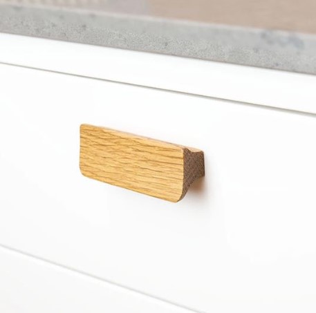 Greep Holsted Eiken gelakt 64 mm