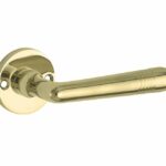 Deurkruk op ongeveerd rozet Art-Deco/Elegant messing ongelakt