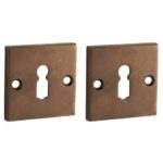 Set van twee Sleutelplaatjes Bauhaus messing antiek brons