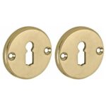 Set van twee sleutelplaatjes Facet BB messing antiek